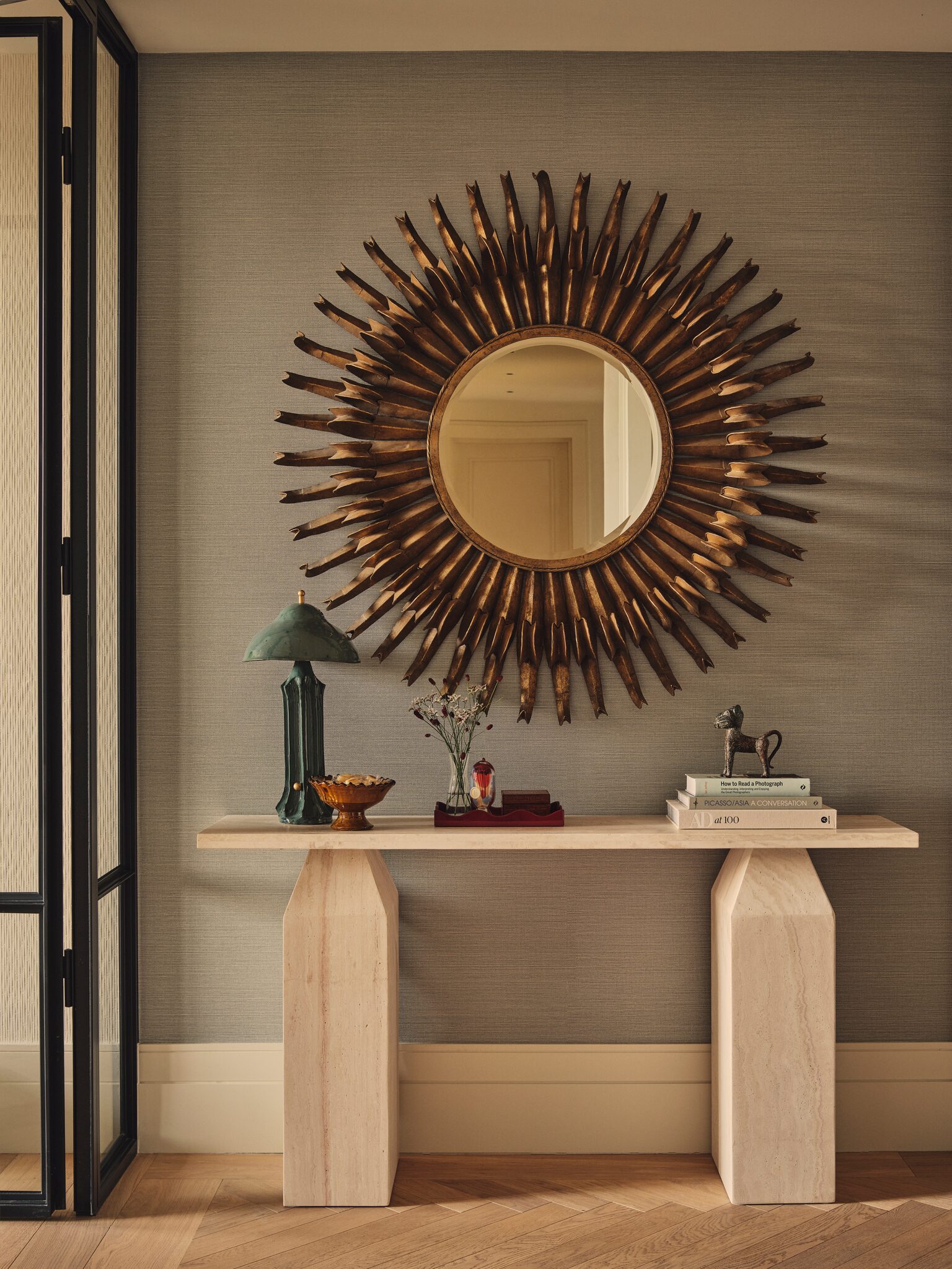 Console table with round mirror at The Whiteley, Queensway